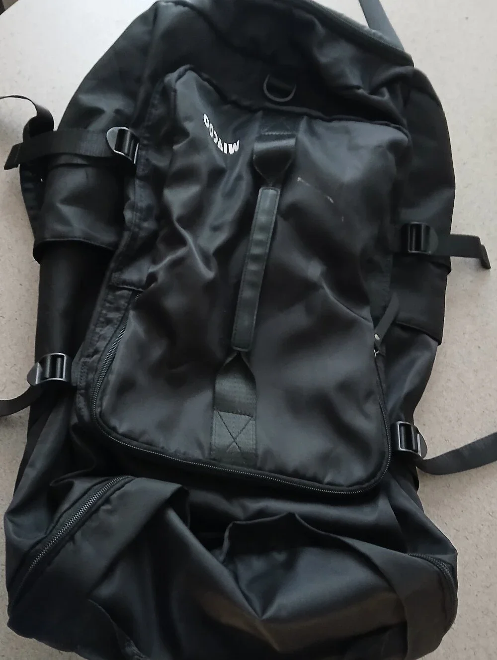 MIYCOO Black Men’s Convertible Travel Backpack Duffel Bag with Shoulder Strap.